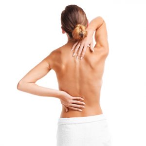 Picture of a woman with backache over white background